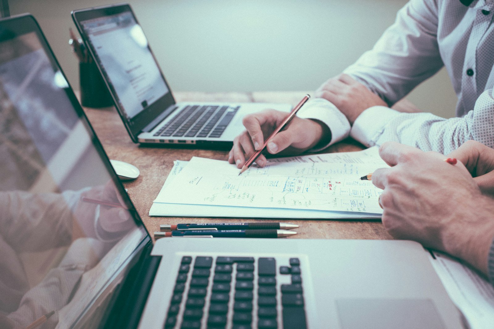 Professionals planning financial and business requirements